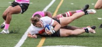 It was a hard-hitting game. Wheeling in pink for cancer awareness. Photo Terry Hancock Photography.