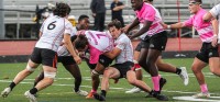 It was a hard-hitting game. Wheeling in pink for cancer awareness. Photo Terry Hancock Photography.