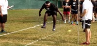 Players take the broad jump test at a previous Austin combine. Alex Goff photo.