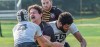 Schuylkill River makes a double tackle in a game from 2019. Colleen McCloskey photo.