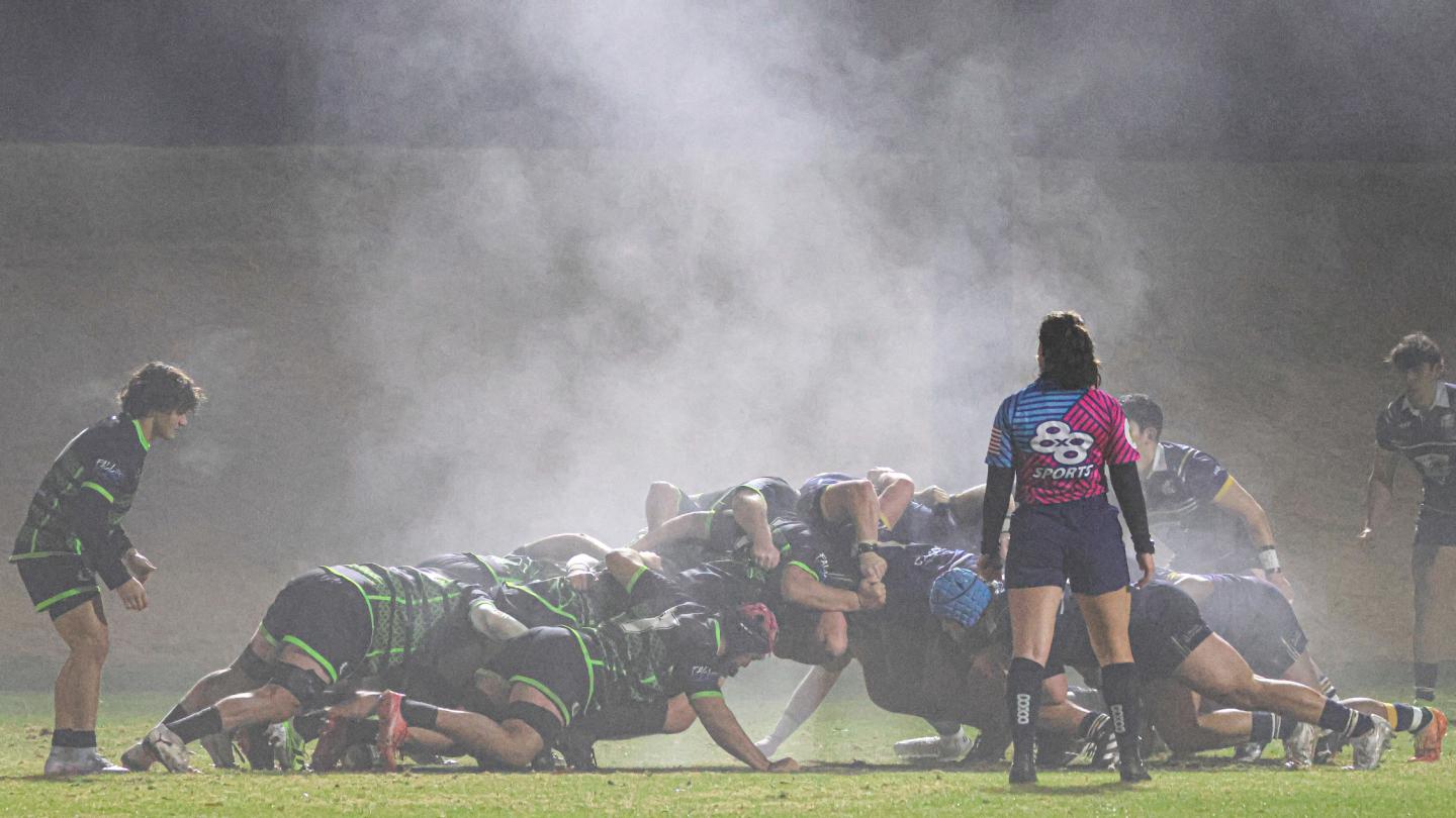 Scrum in the fog UBC vs Life at the 2025 Fall Classic. Photo Calder Cahill.
