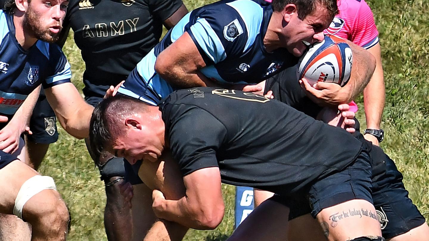 George Engels lays in a hit against Mary Washington. Photo David Hughes.