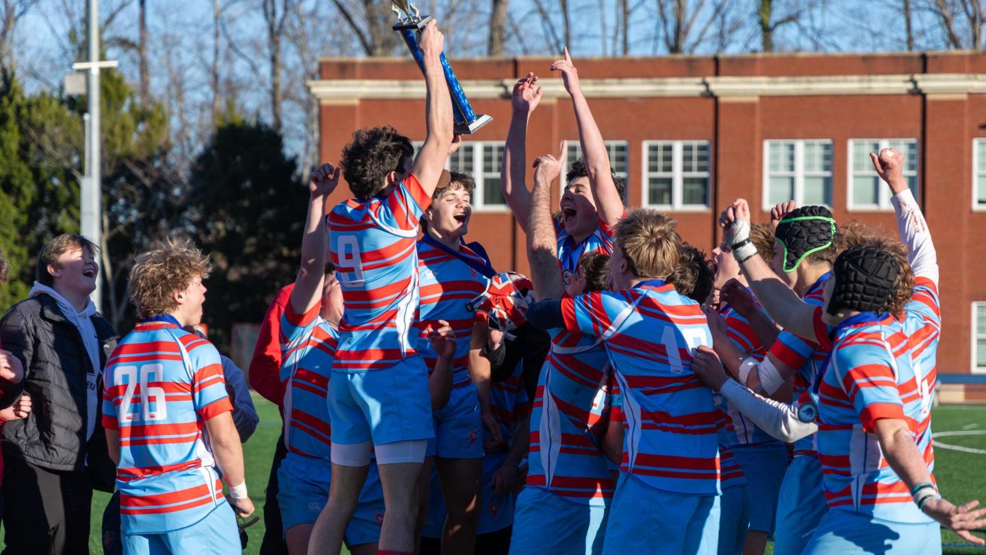 Charlotte Catholic players celebrate the NC repeat.