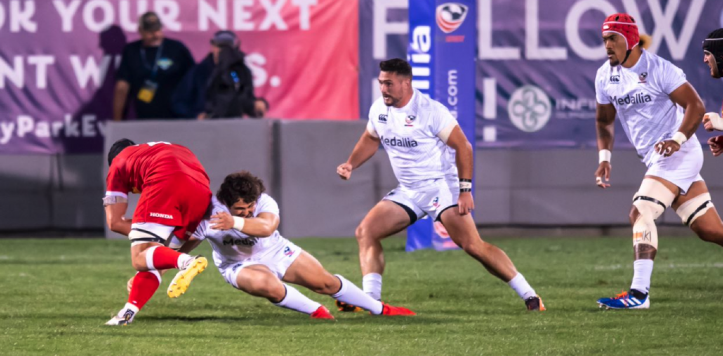 andrew guerra makes a tackle david barpal andrew guerra makes a tackle david barpal