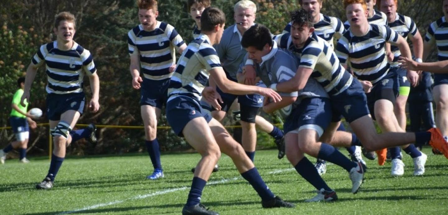 prop reily barlett carries the ball and a gc defender for prep prop reily barlett carries the ball and a gc defender for prep