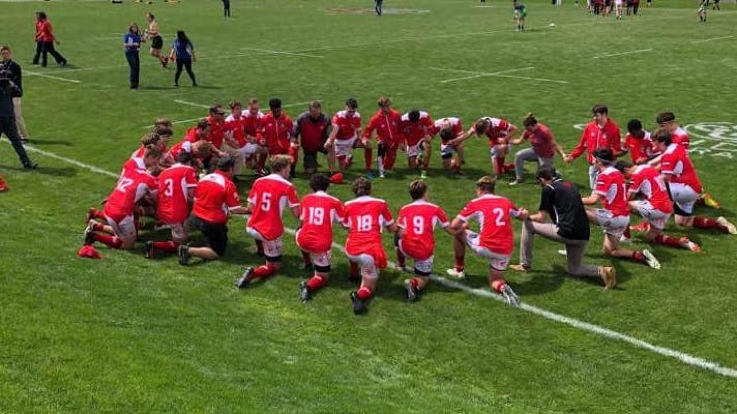 regis jesuit kneels regis jesuit kneels